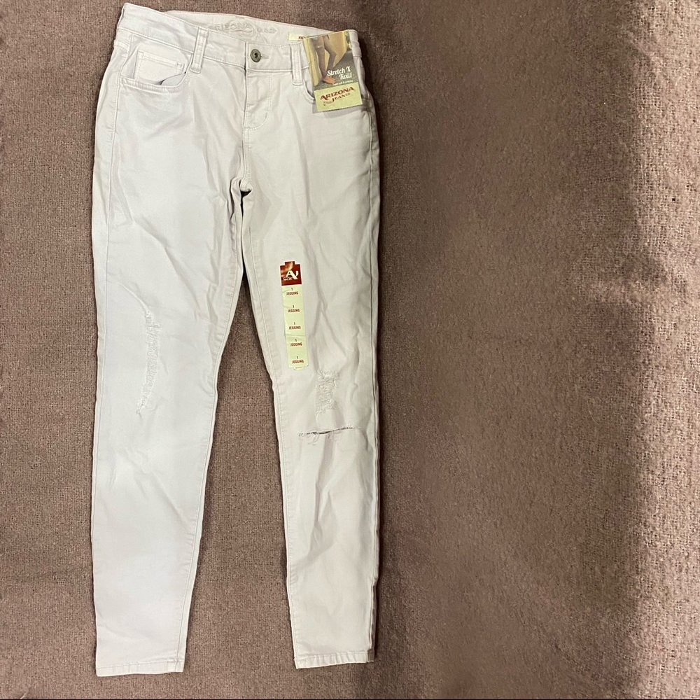 Arizona pale pink stretch Jeggings slightly distressed in size 1, new with tags